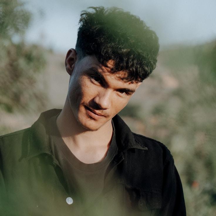 Kaveri Mehta, Lead Design Curator at BrimStoneVector, reviewing corporate floral arrangements